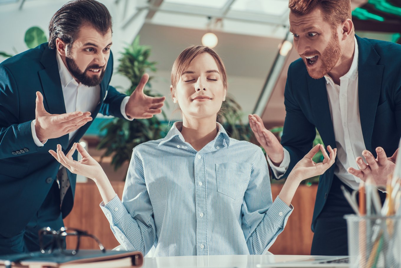 Image of three people quarreling